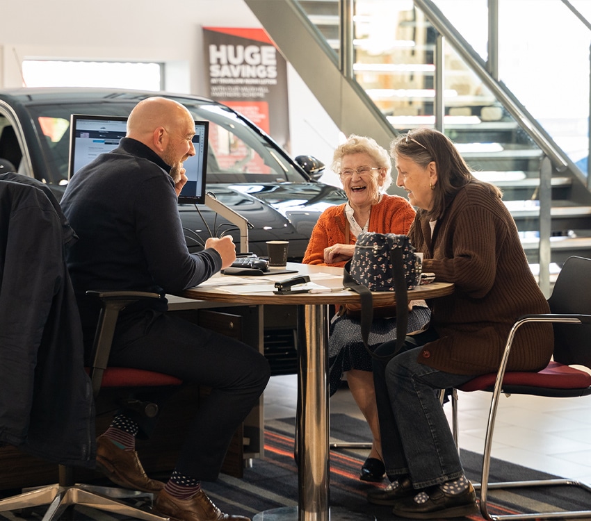 Women purchasing new car